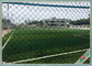 Лужайка футбола на открытом воздухе зеленых тангажей травы футбольного поля искусственных синтетическая искусственная поставщик